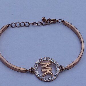 Michael Kors gold tone bracelet with clear stones